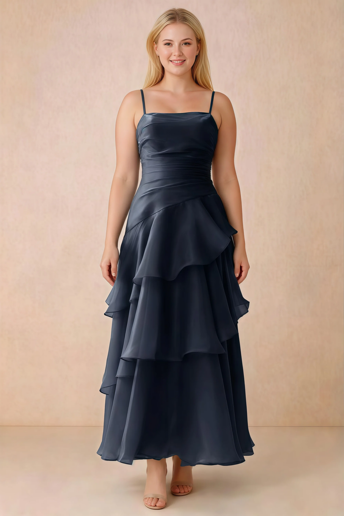 Front studio view of Ava navy ruffle dress with a straight neckline and gathered waist