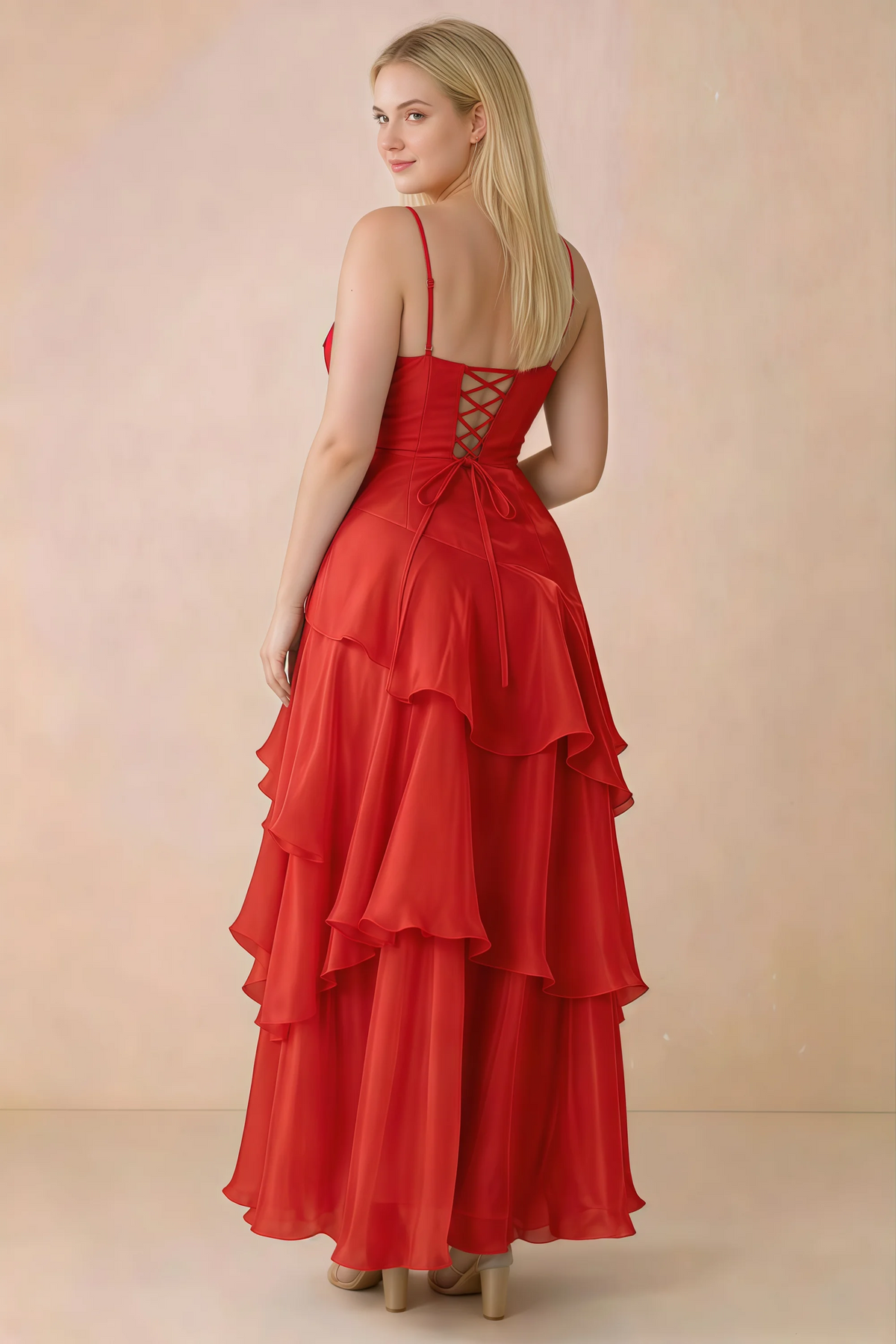 Rear studio view of Ava red maxi dress showing the lace-up bodice and long tiered skirt