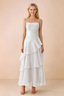 Front view of Ava white chiffon maxi dress with thin straps, a fitted bodice and cascading ruffle tiers