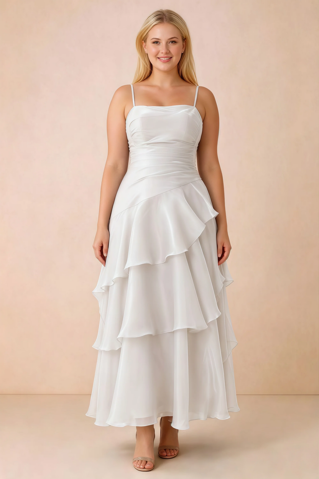 Front studio view of Ava white ruffle dress with a straight neckline and gathered waist