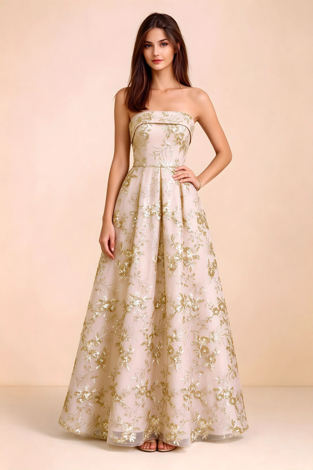 Front view of Avis champagne floral sequin strapless maxi dress with a fitted waist and full A-line skirt