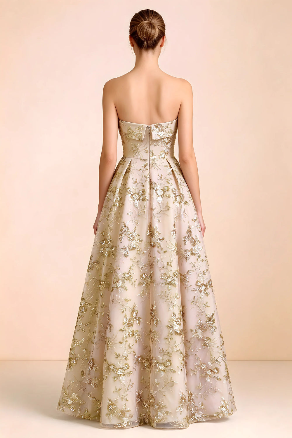 Translation missing: en.Back view of Avis champagne strapless sequin dress showing the fitted bodice and floor-length skirt content.product_image_secondary