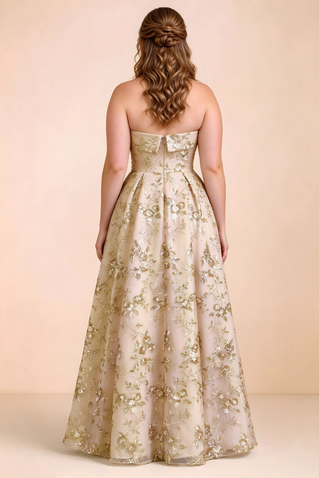 Rear studio view of Avis champagne floral sequin dress showing the bodice and flowing A-line hem