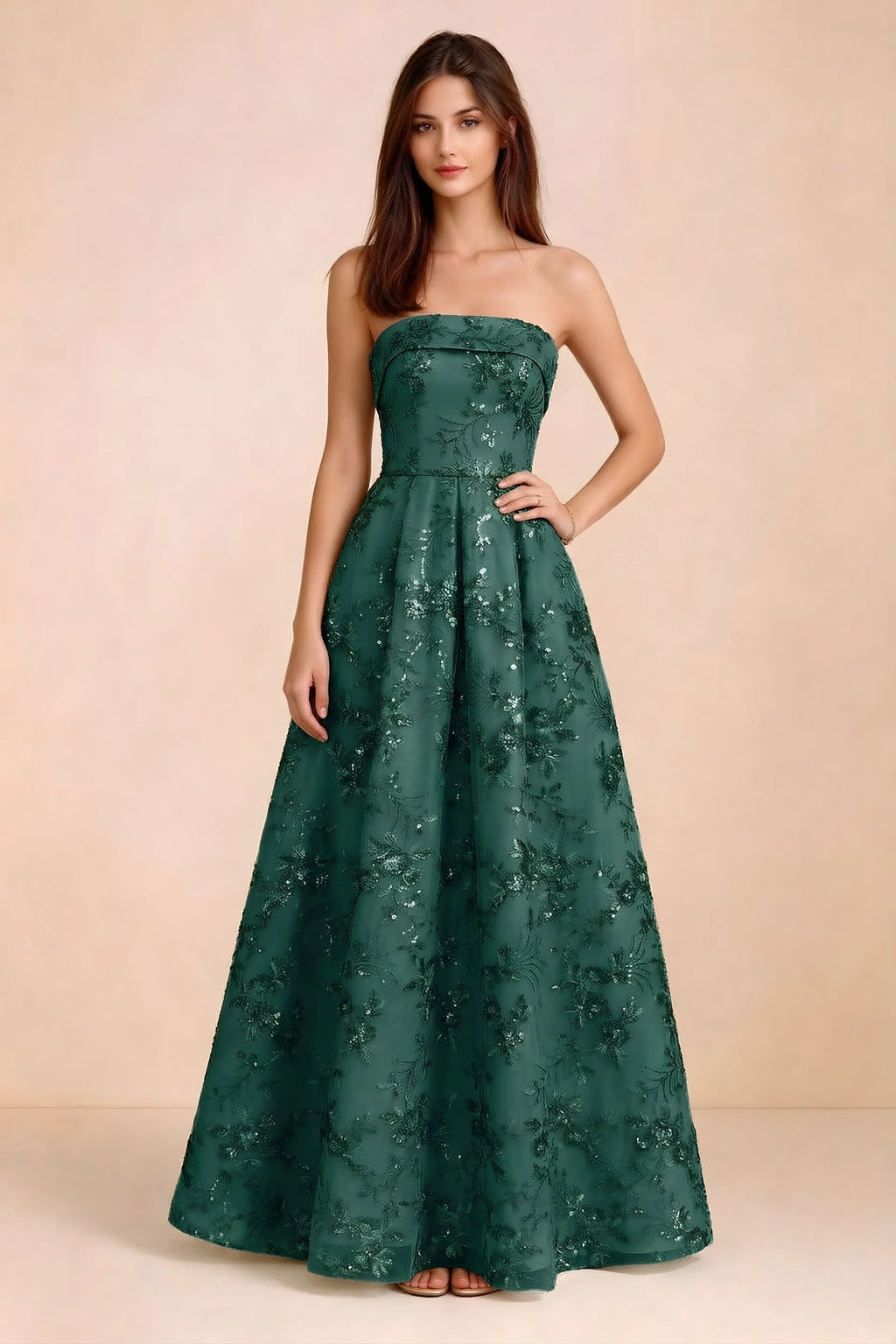 Front view of Avis emerald green floral sequin strapless maxi dress with a fitted waist and full A-line skirt