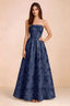 Front view of Avis navy floral sequin strapless maxi dress with a fitted waist and full A-line skirt