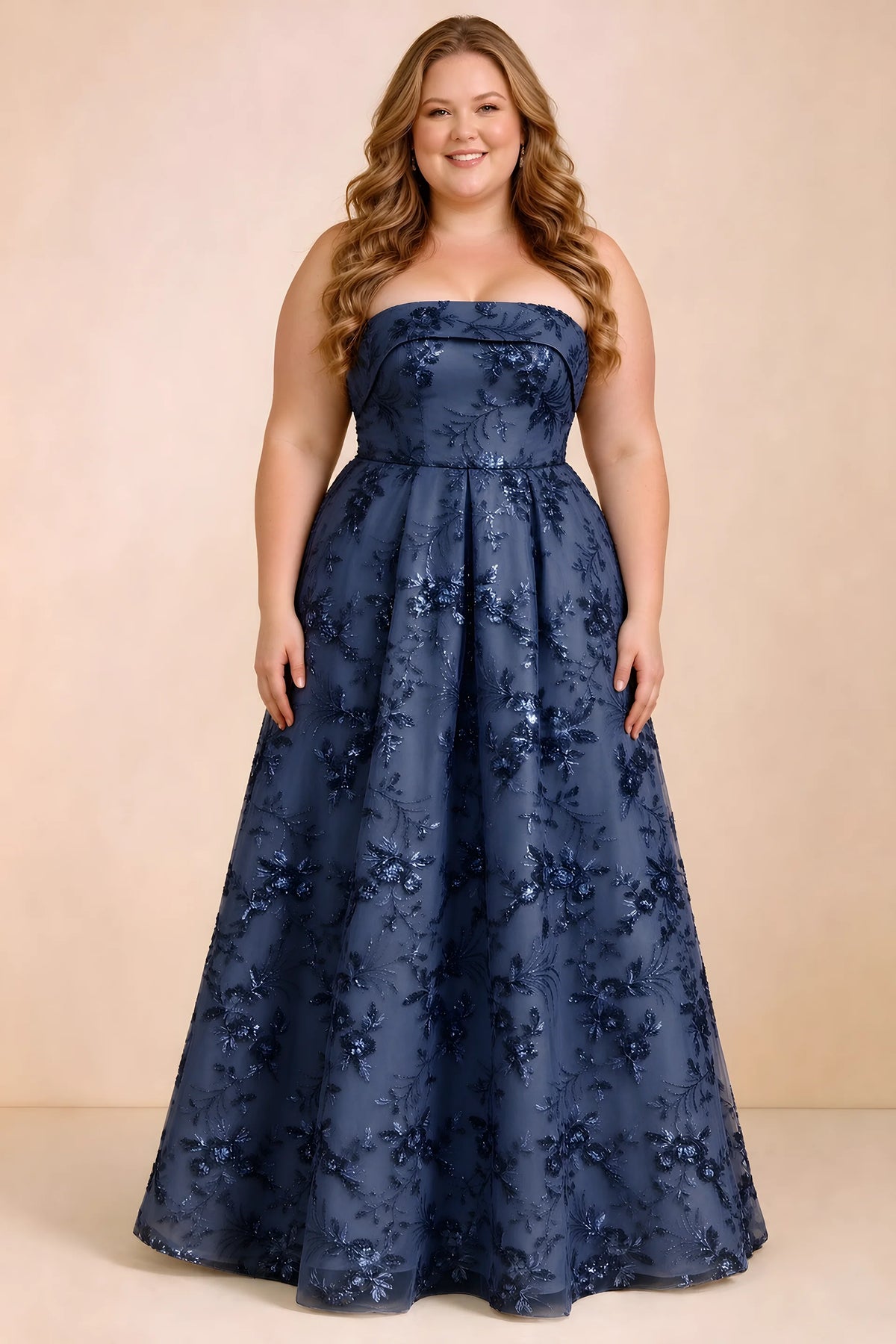 Front studio view of Avis navy strapless sequin dress with a defined waist and full skirt