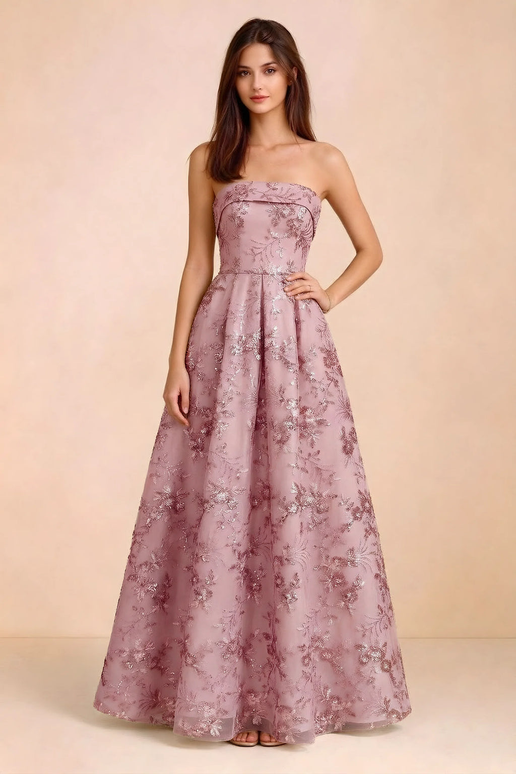 Front view of Avis pink floral sequin strapless maxi dress with a fitted waist and full A-line skirt