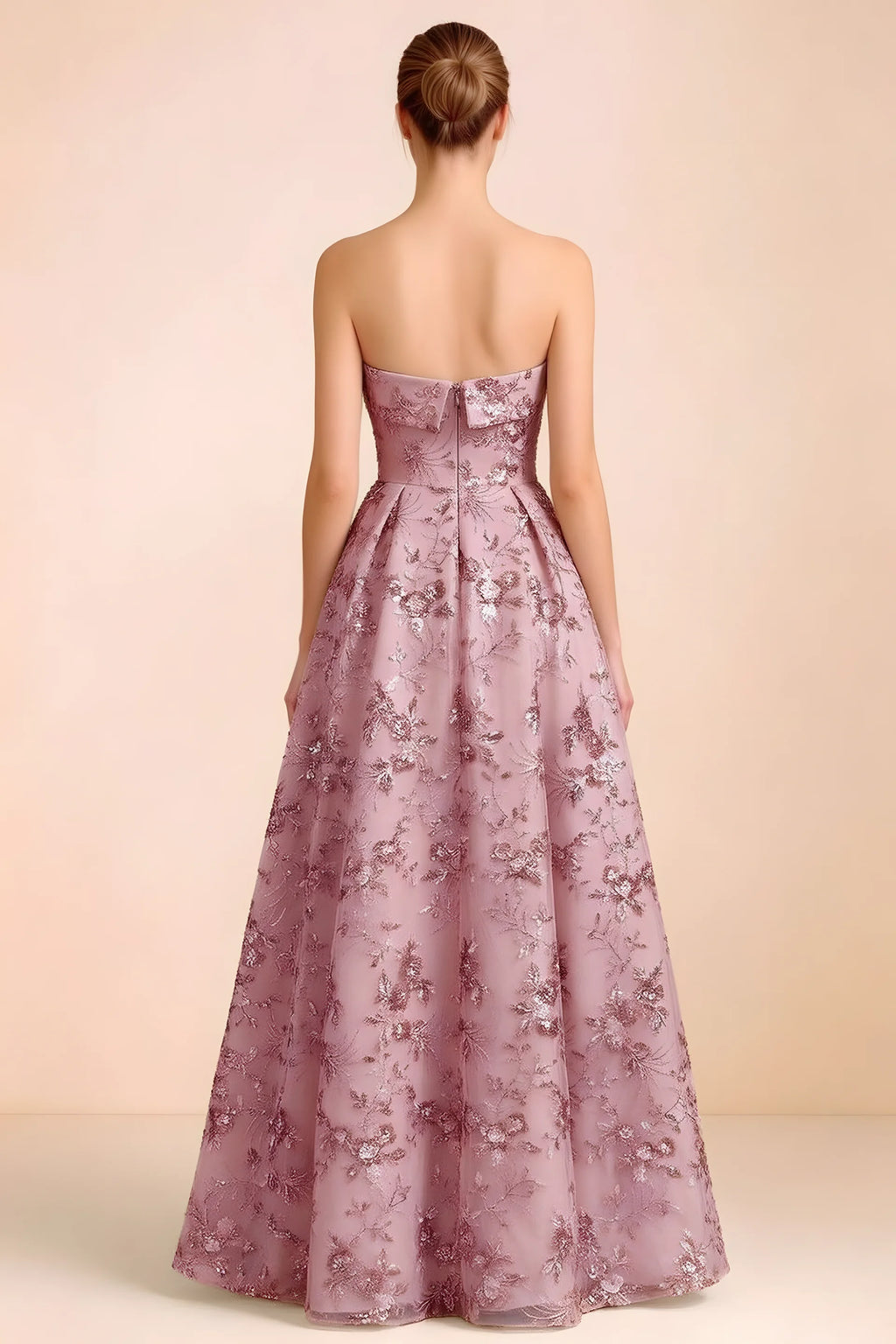 Back view of Avis pink strapless sequin dress showing the fitted bodice and floor-length skirt