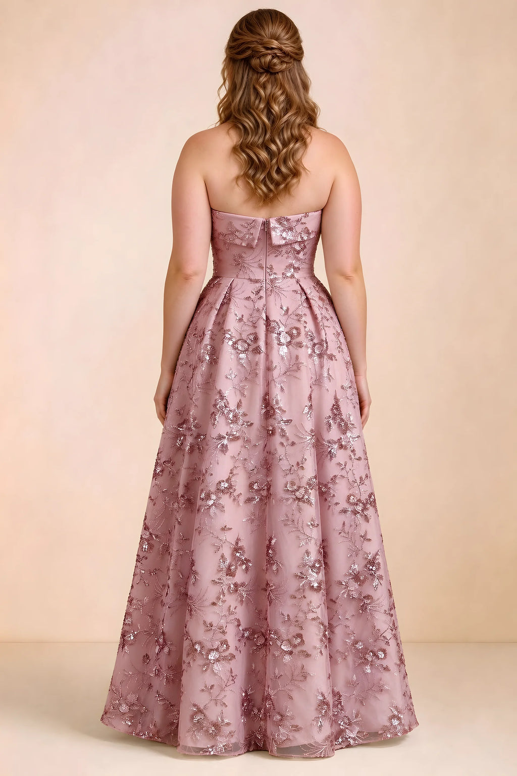 Rear studio view of Avis pink floral sequin dress showing the bodice and flowing A-line hem