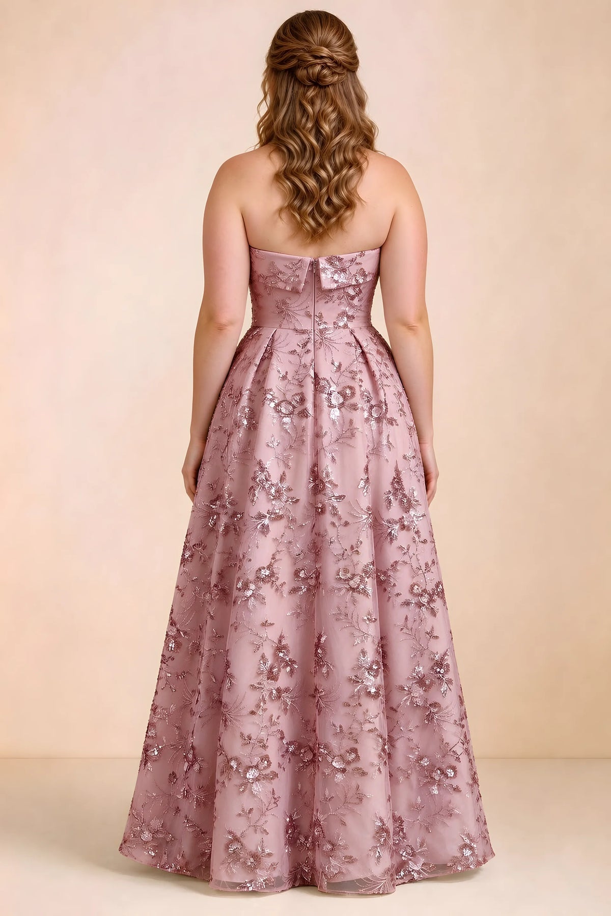 Rear studio view of Avis pink floral sequin dress showing the bodice and flowing A-line hem