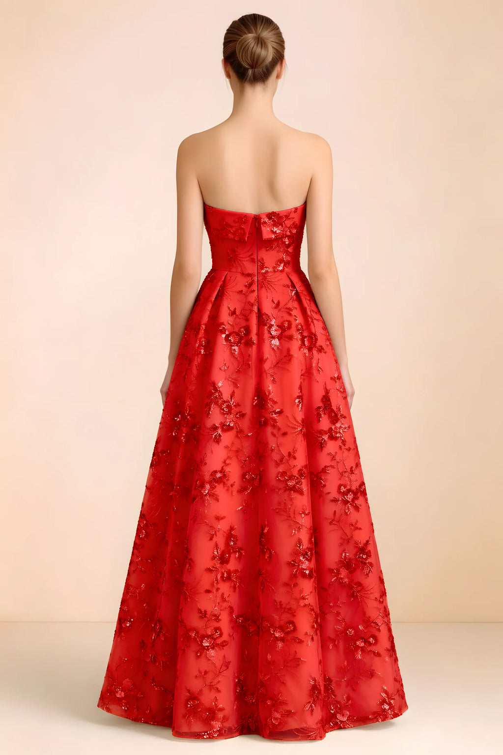 Back view of Avis red strapless sequin dress showing the fitted bodice and floor-length skirt