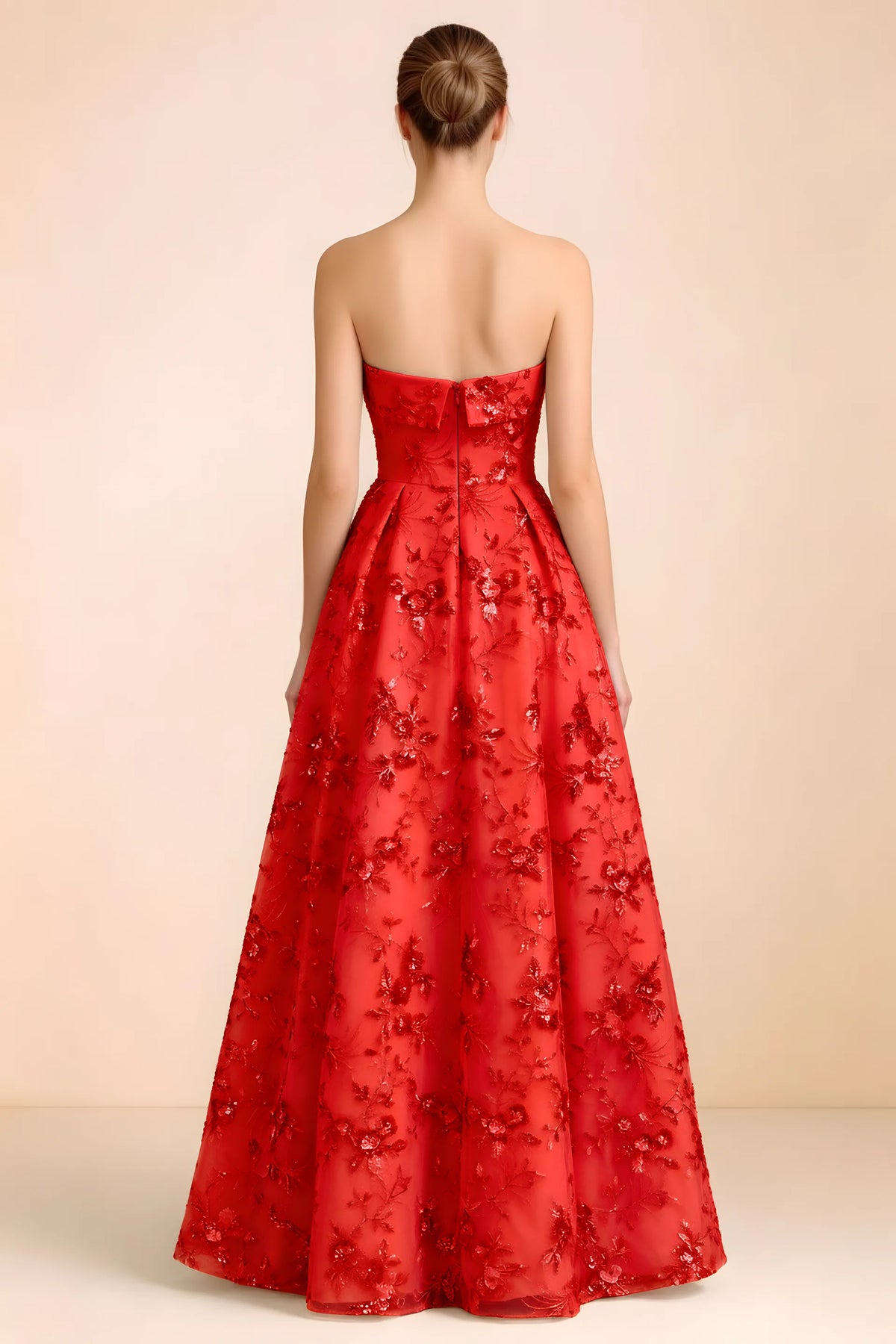 Back view of Avis red strapless sequin dress showing the fitted bodice and floor-length skirt