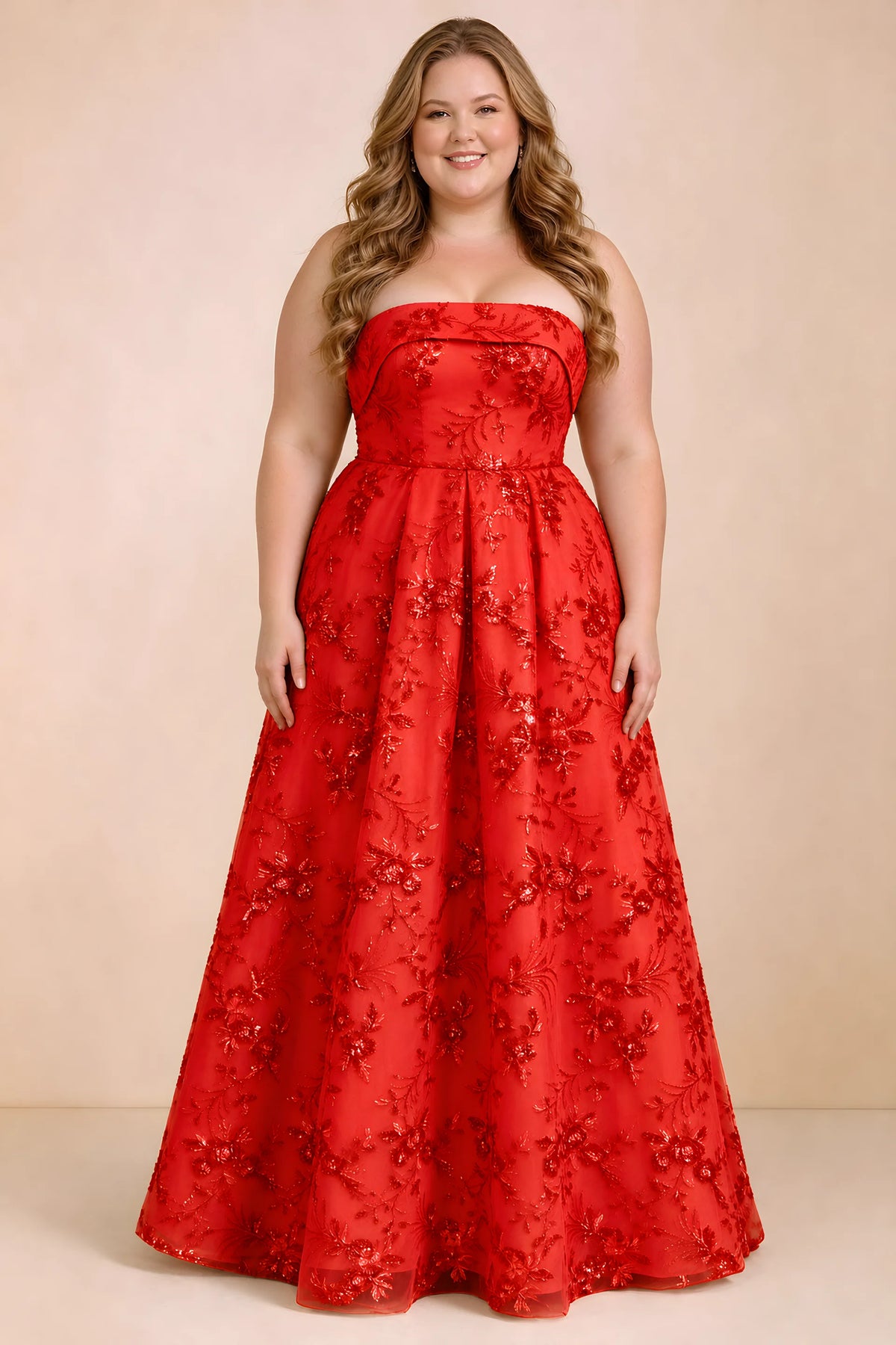 Front studio view of Avis red strapless sequin dress with a defined waist and full skirt