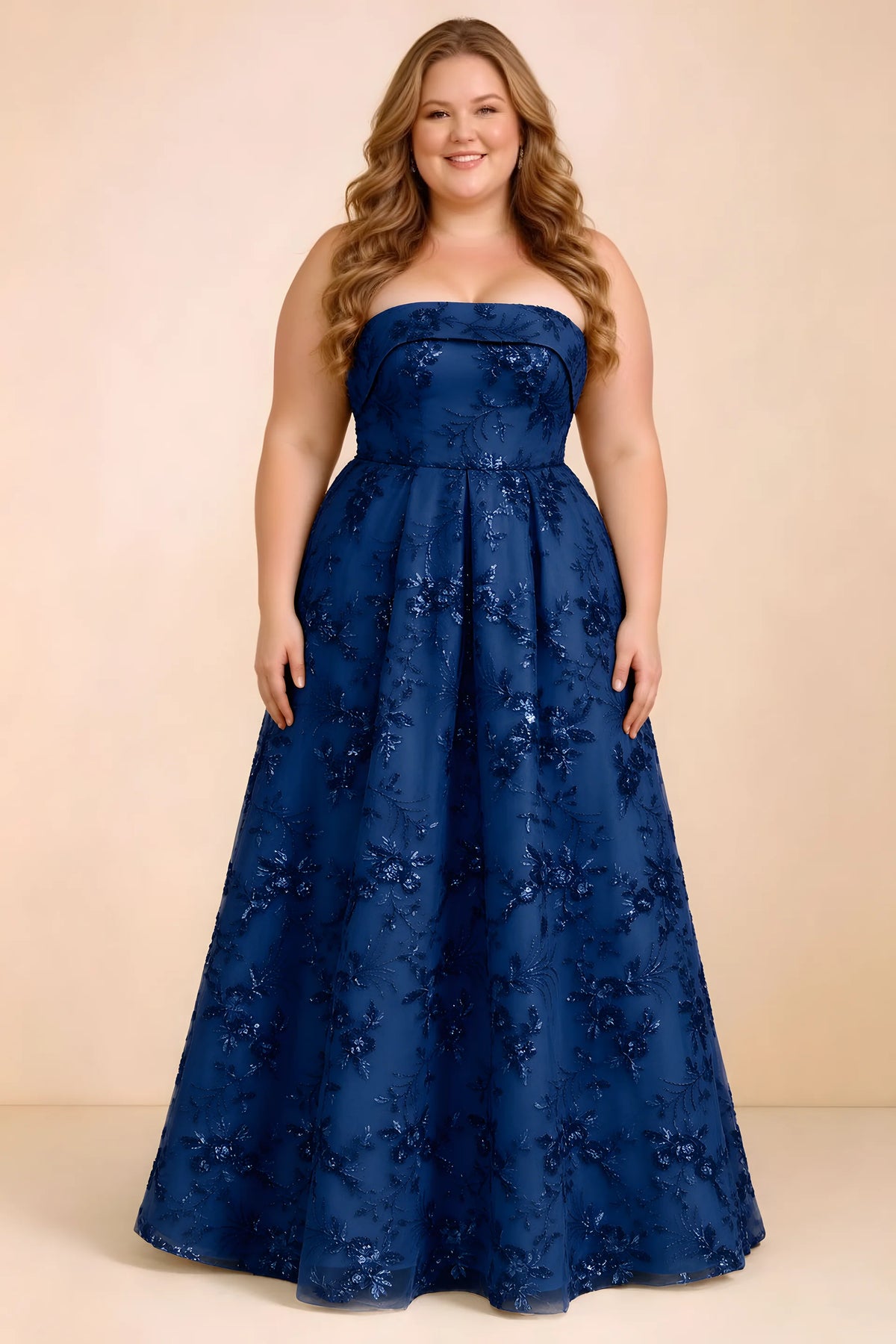 Front studio view of Avis royal blue strapless sequin dress with a defined waist and full skirt