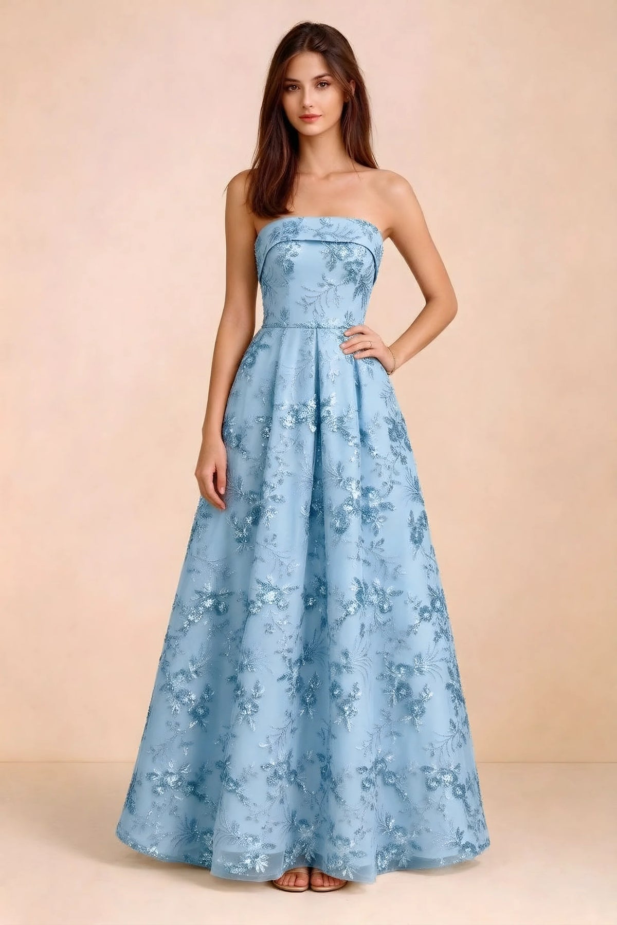 Front view of Avis sky blue floral sequin strapless maxi dress with a fitted waist and full A-line skirt