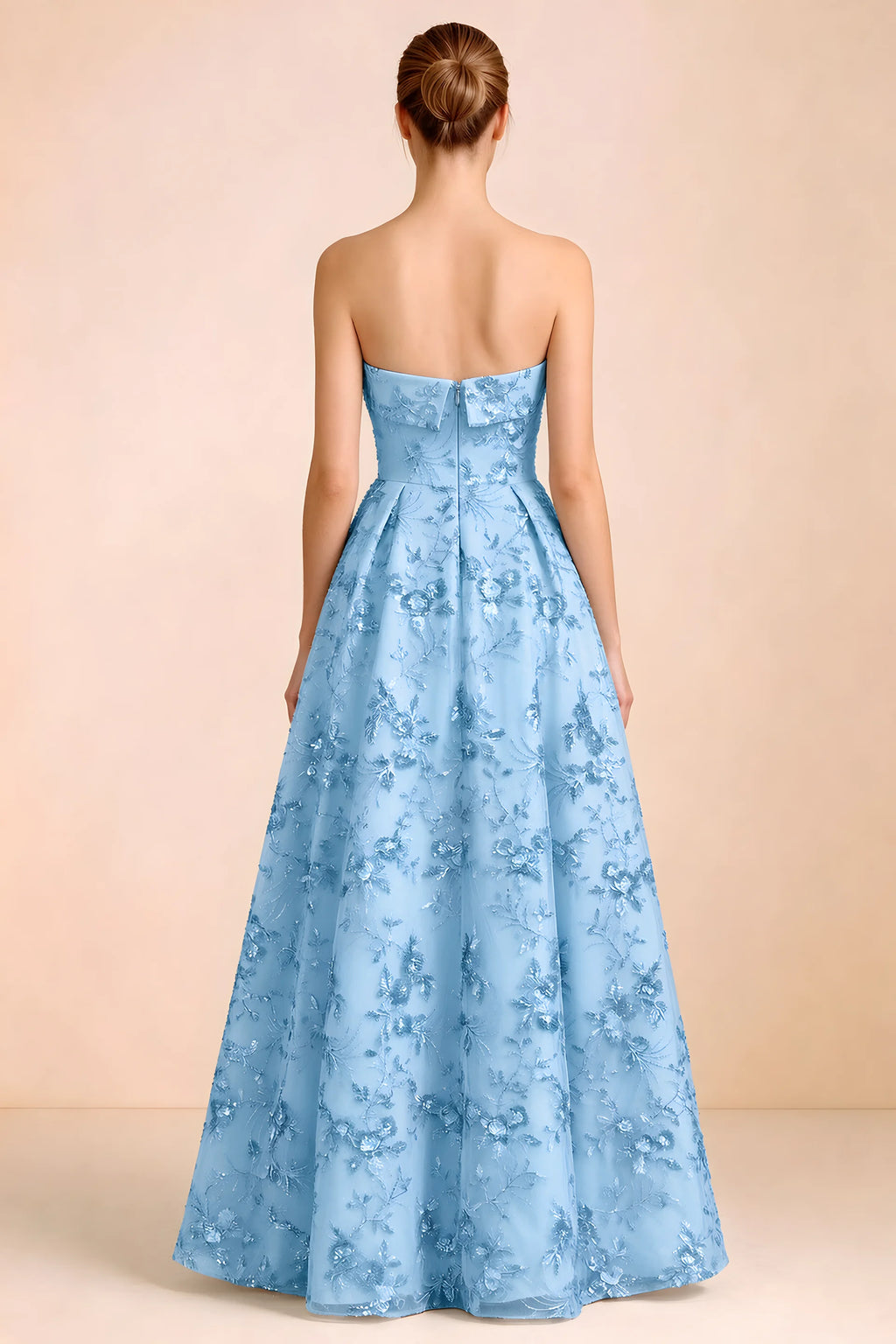 Back view of Avis sky blue strapless sequin dress showing the fitted bodice and floor-length skirt