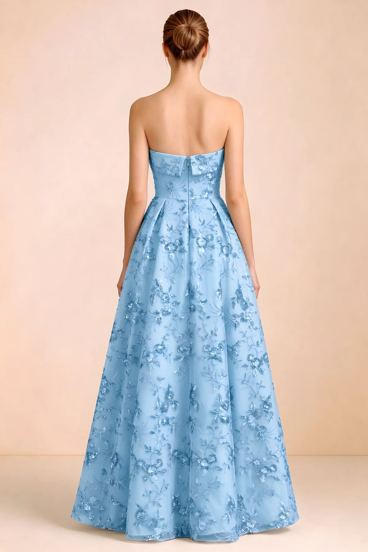 Back view of Avis sky blue strapless sequin dress showing the fitted bodice and floor-length skirt