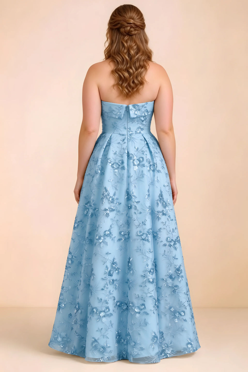 Rear studio view of Avis sky blue floral sequin dress showing the bodice and flowing A-line hem