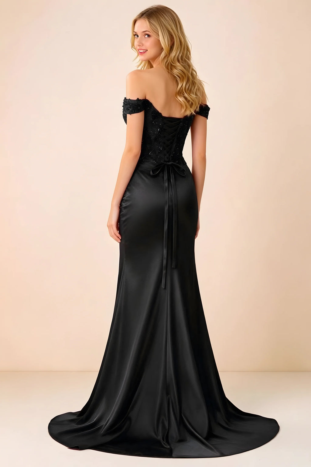 Back view of Beatrix black maxi dress showing the lace-up bodice and sweeping mermaid hem