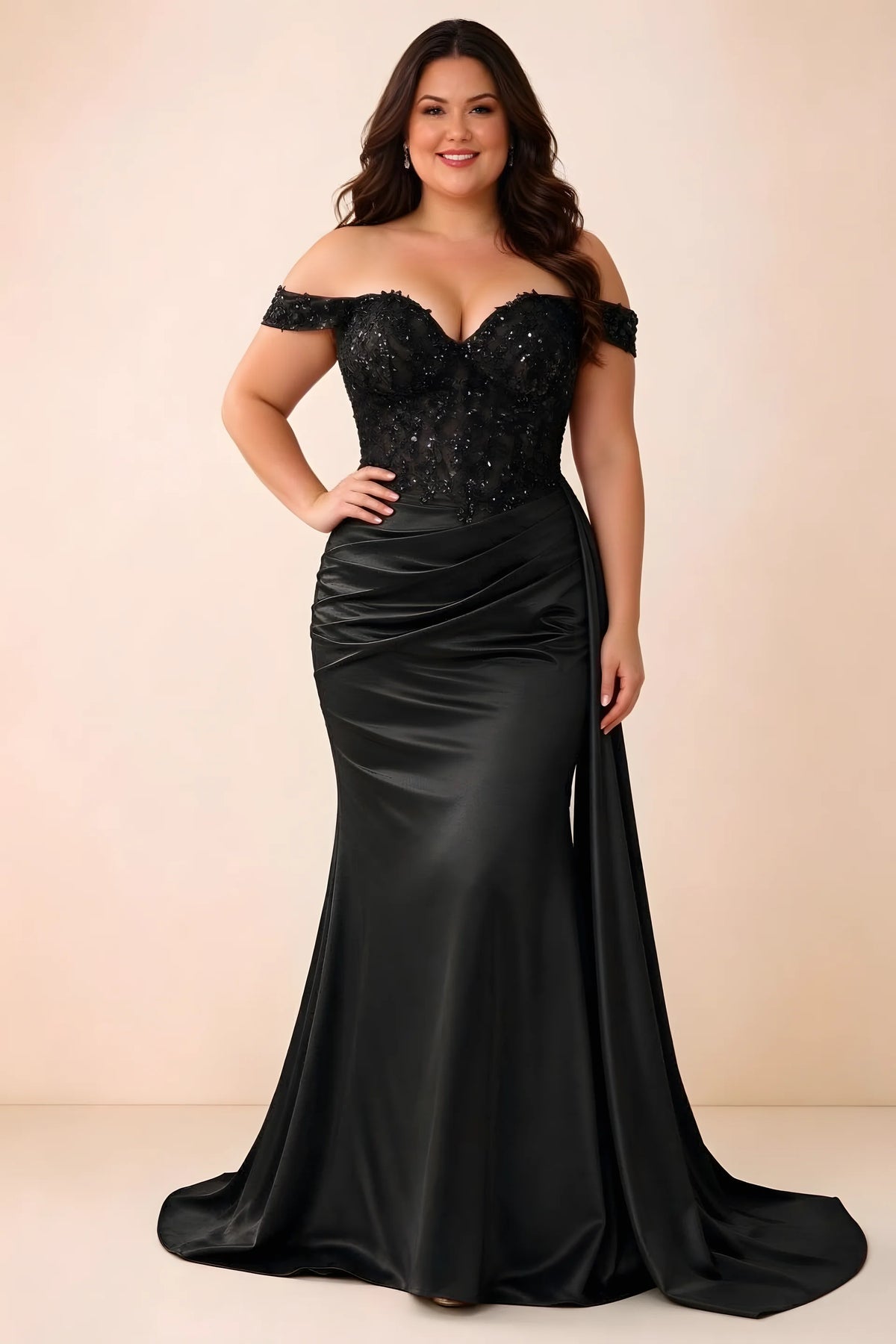Front studio view of Beatrix black off-shoulder dress with a fitted bodice and ruched skirt