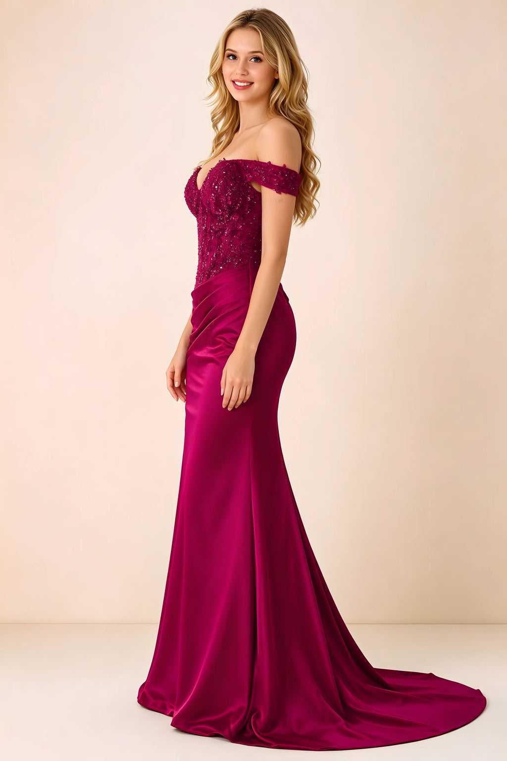 Side view of Beatrix burgundy maxi dress showing the fitted hips and draped skirt