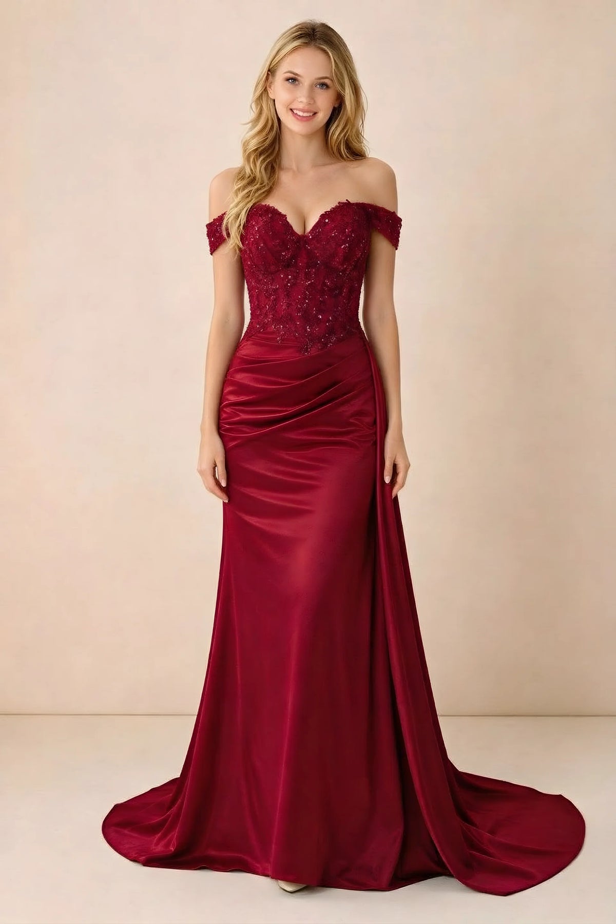 Front view of Beatrix red off-shoulder satin maxi dress with a sweetheart bodice and ruched hip drape