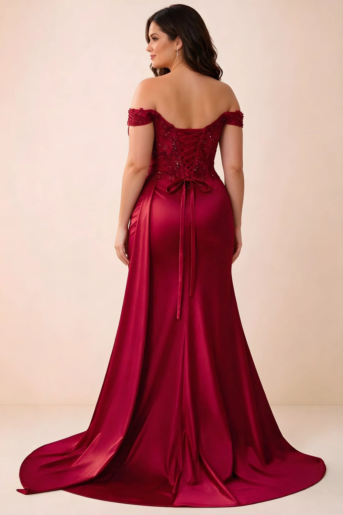 Rear studio view of Beatrix red satin maxi dress showing the back ties and mermaid silhouette