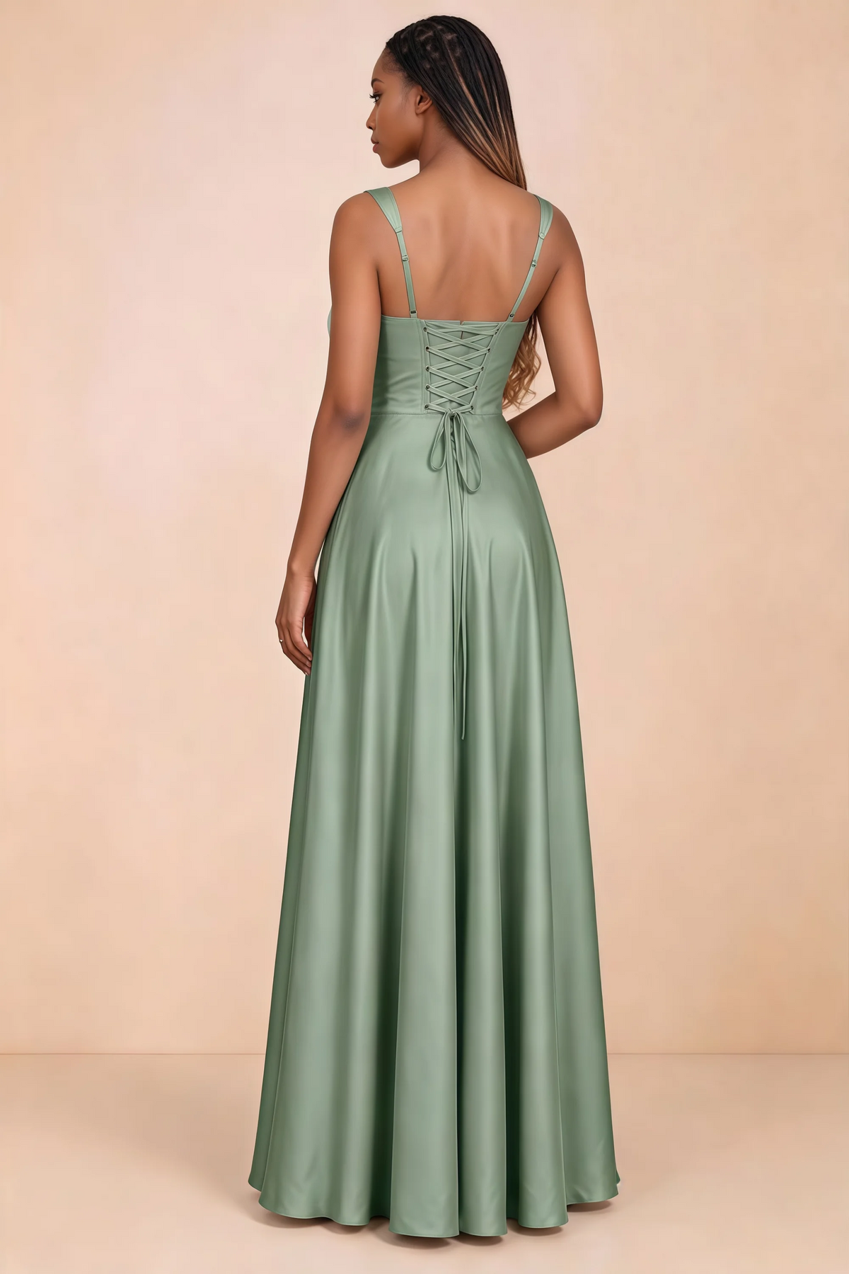 Back studio view of Becky aloe green satin maxi dress showing shoulder straps and waist-length lacing