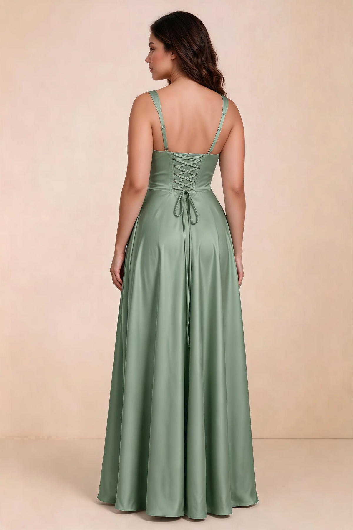 Rear studio view of Becky aloe green satin maxi dress showing crossed back lacing above the full skirt