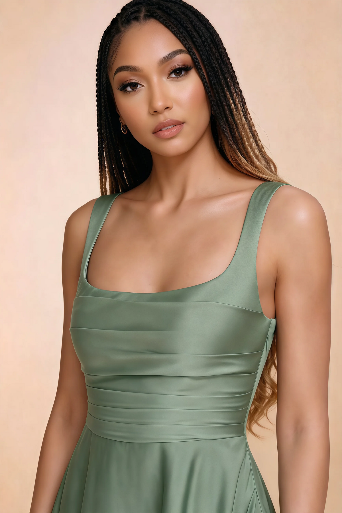 Close-up of Becky aloe green square neckline, shoulder straps and horizontal bodice pleats
