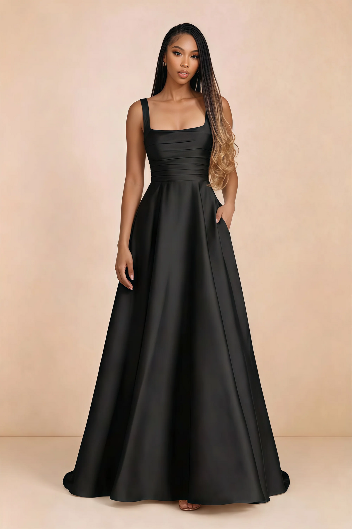Front studio view of Becky black satin maxi dress showing the square neckline, pleated bodice and full A-line skirt