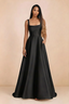 Front studio view of Becky black satin maxi dress showing the square neckline, pleated bodice and full A-line skirt