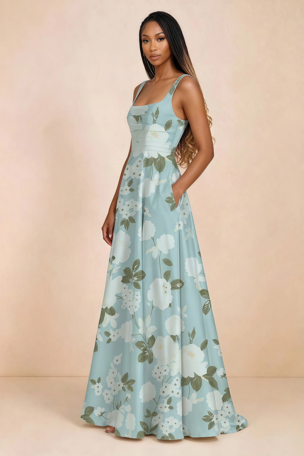 Three-quarter studio view of Becky blue floral satin maxi dress with a hand resting in the side pocket