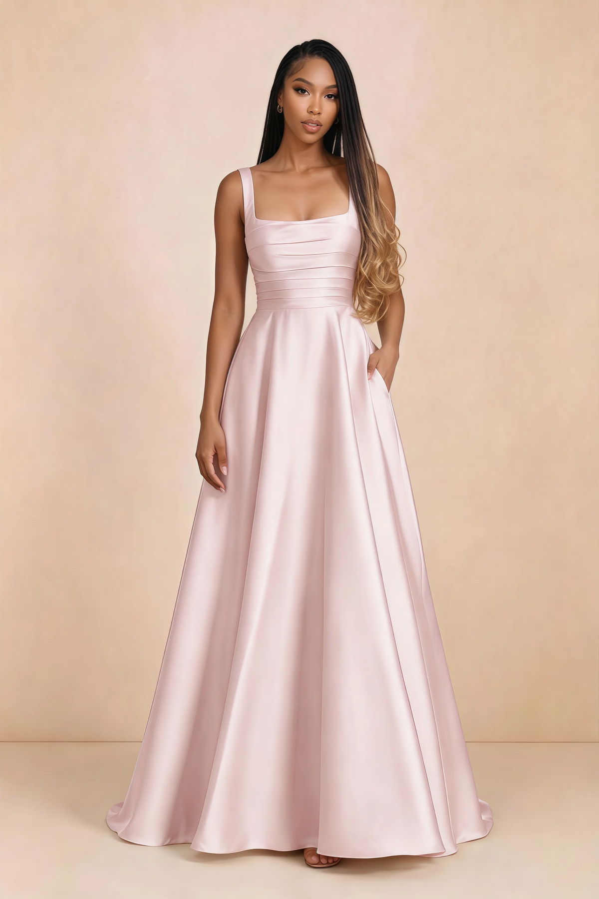 Front studio view of Becky blush satin maxi dress showing the square neckline, pleated bodice and full A-line skirt