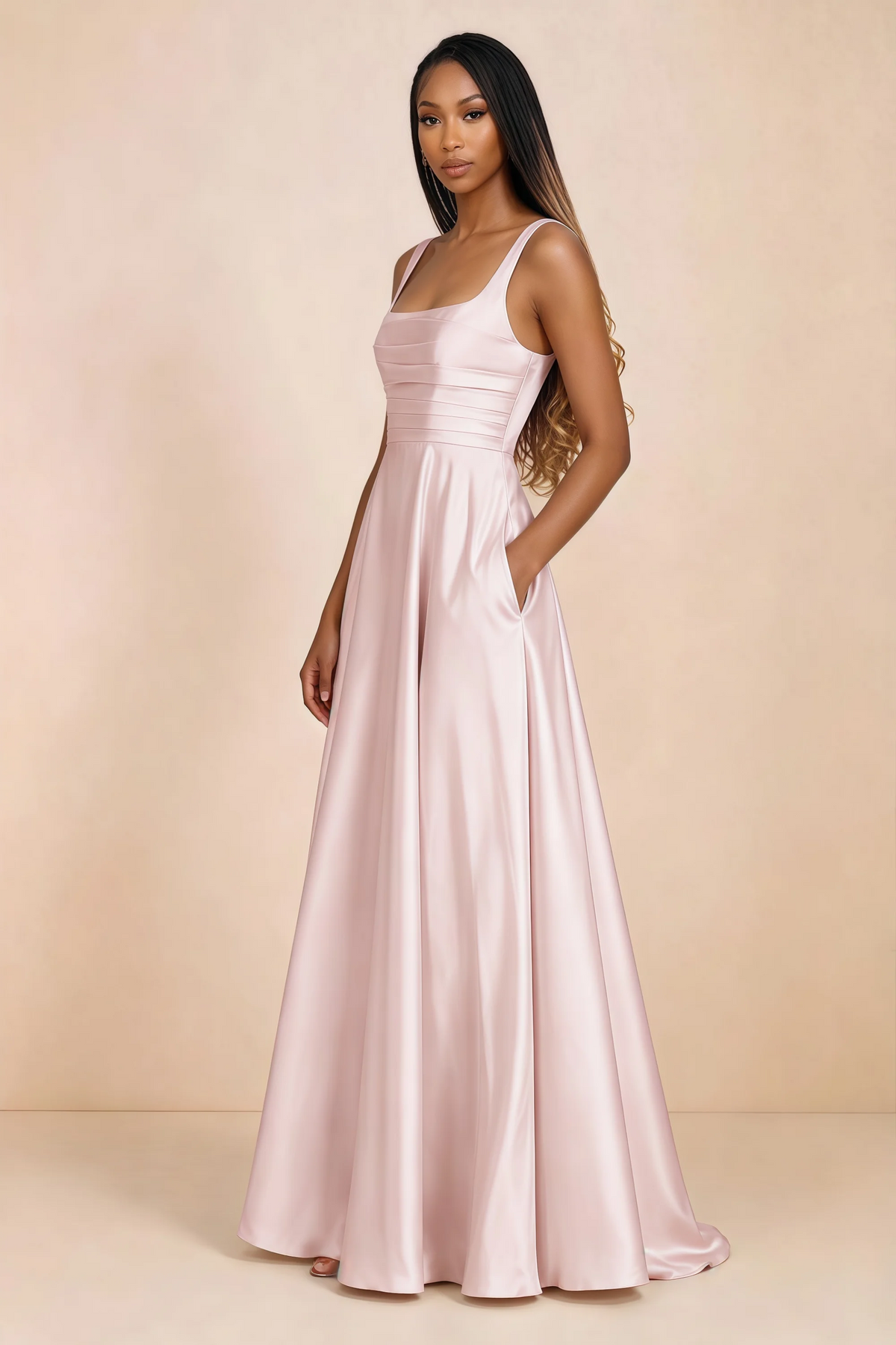 Three-quarter studio view of Becky blush satin maxi dress with a hand resting in the side pocket