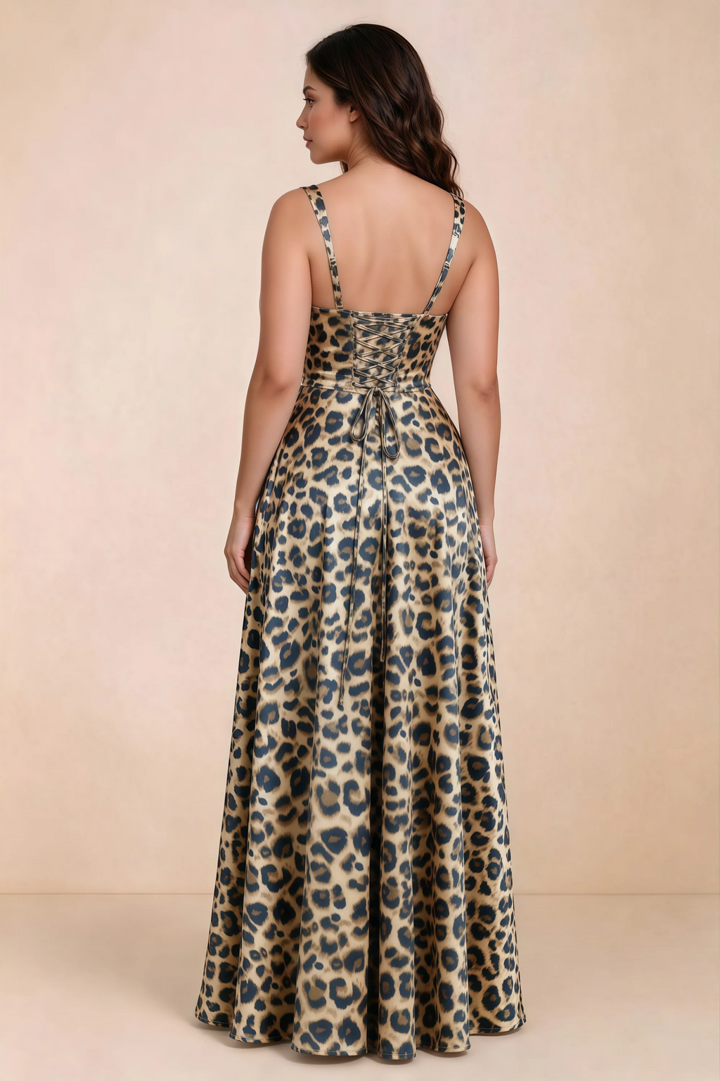 Rear studio view of Becky brown leopard satin maxi dress showing crossed back lacing above the full skirt