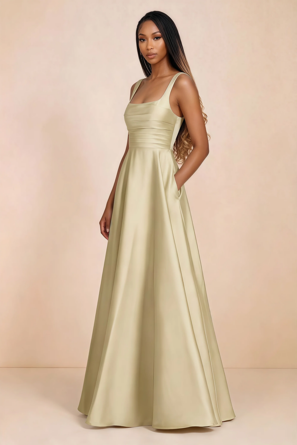 Three-quarter studio view of Becky butter yellow satin maxi dress with a hand resting in the side pocket