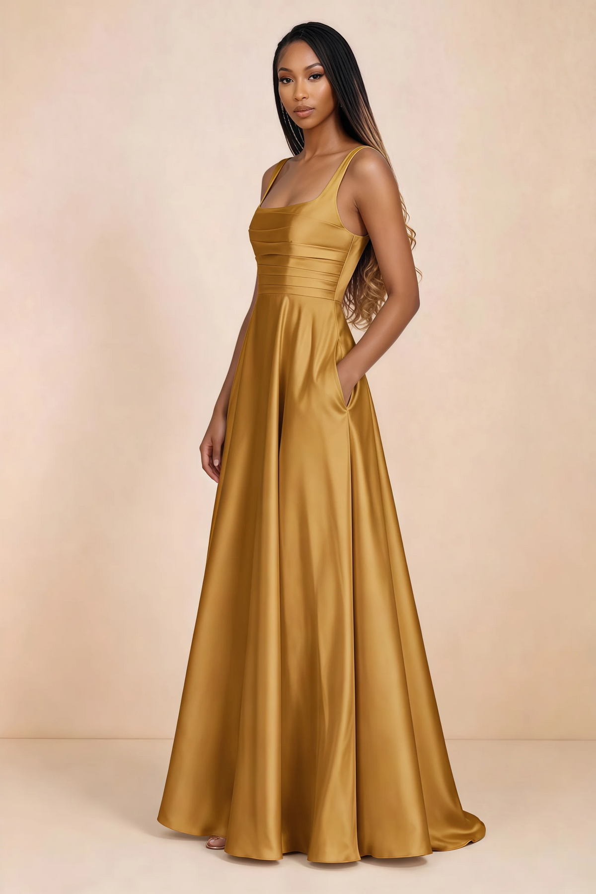 Three-quarter studio view of Becky butterscotch satin maxi dress with a hand resting in the side pocket