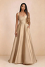 Front studio view of Becky champagne satin maxi dress showing the square neckline, pleated bodice and full A-line skirt