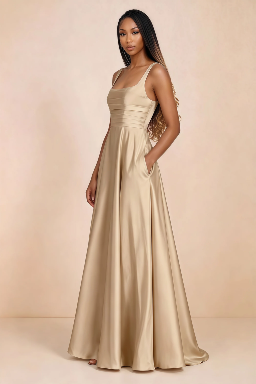 Three-quarter studio view of Becky champagne satin maxi dress with a hand resting in the side pocket