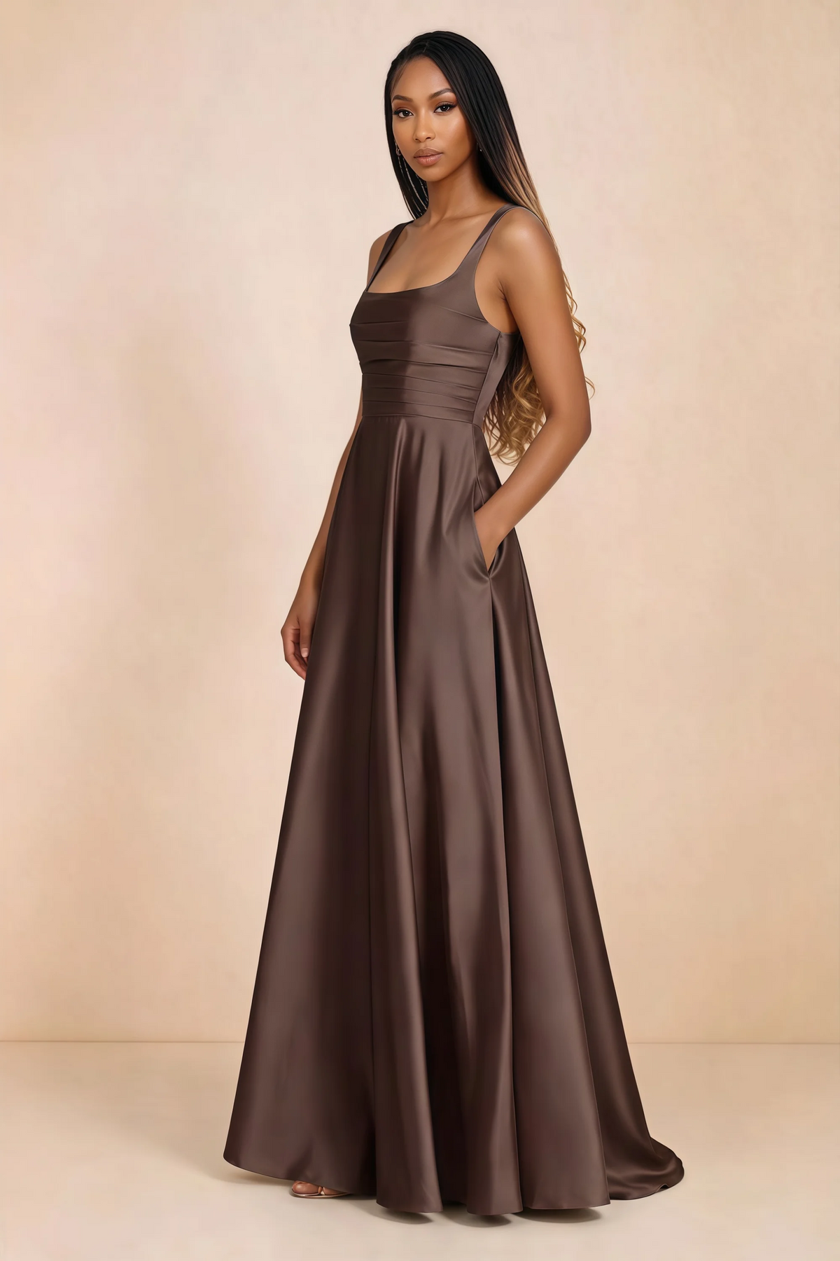 Three-quarter studio view of Becky chocolate satin maxi dress with a hand resting in the side pocket