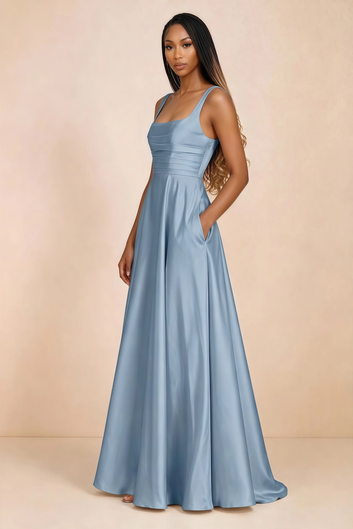 Three-quarter studio view of Becky dusty blue satin maxi dress with a hand resting in the side pocket