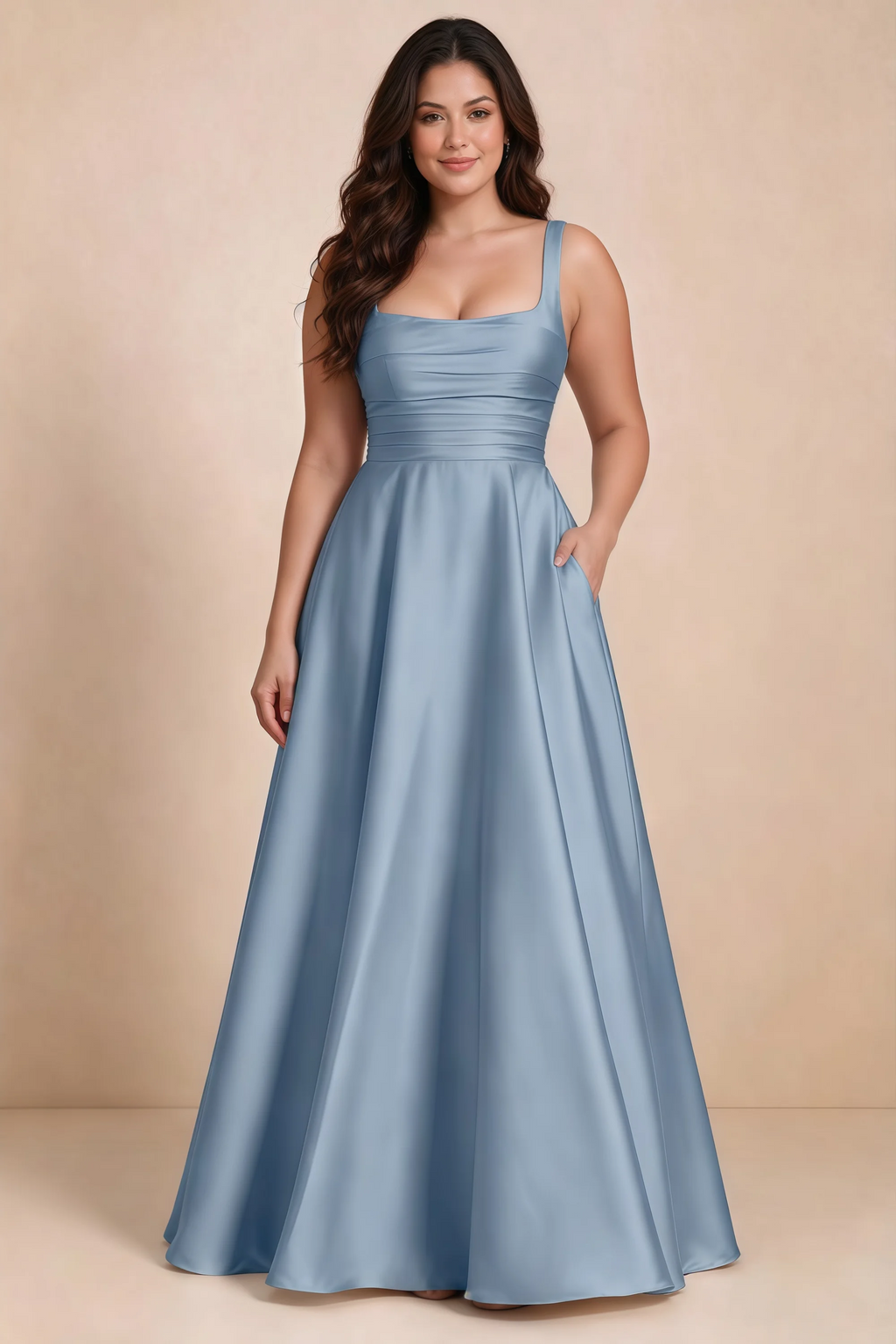 Front studio view of Becky dusty blue satin maxi dress showing the defined waist and flowing skirt
