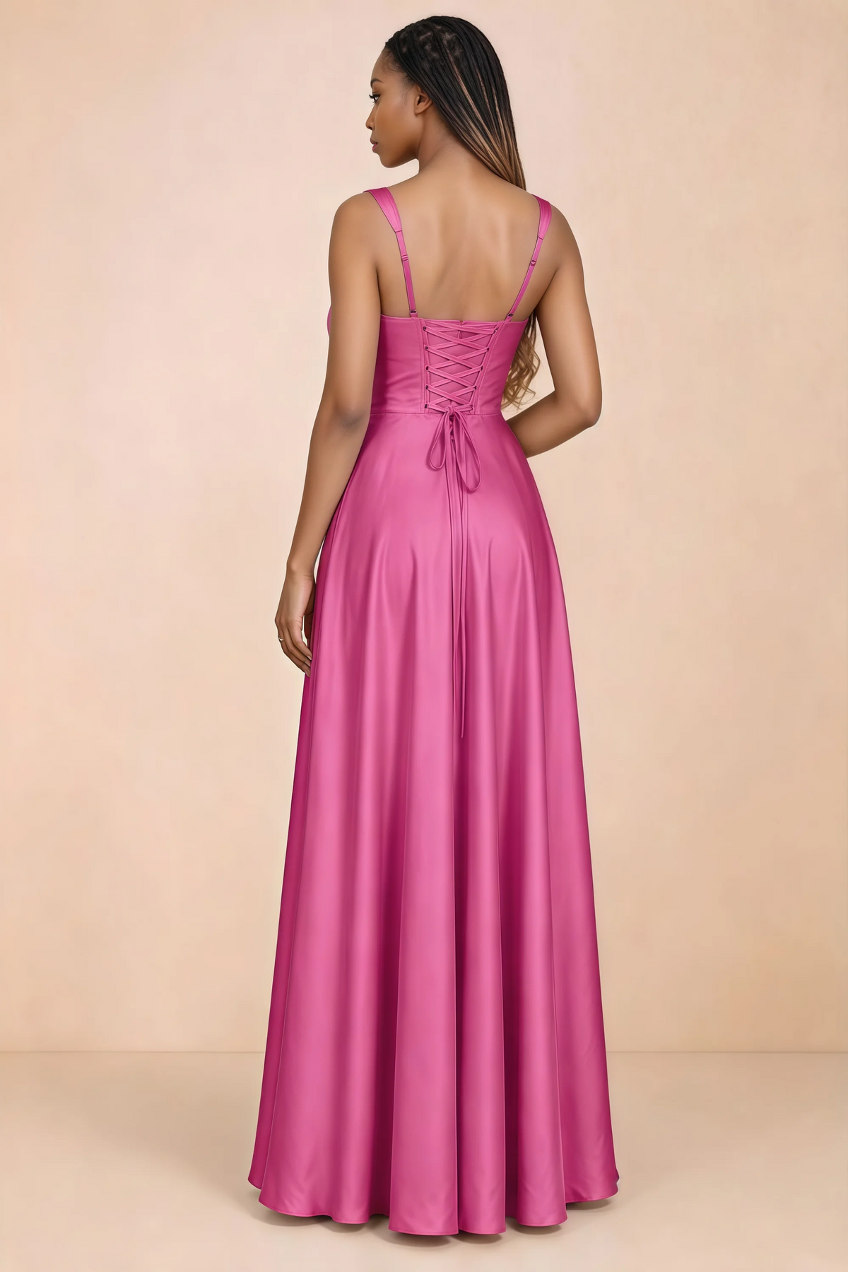 Back studio view of Becky fuchsia satin maxi dress showing shoulder straps and waist-length lacing