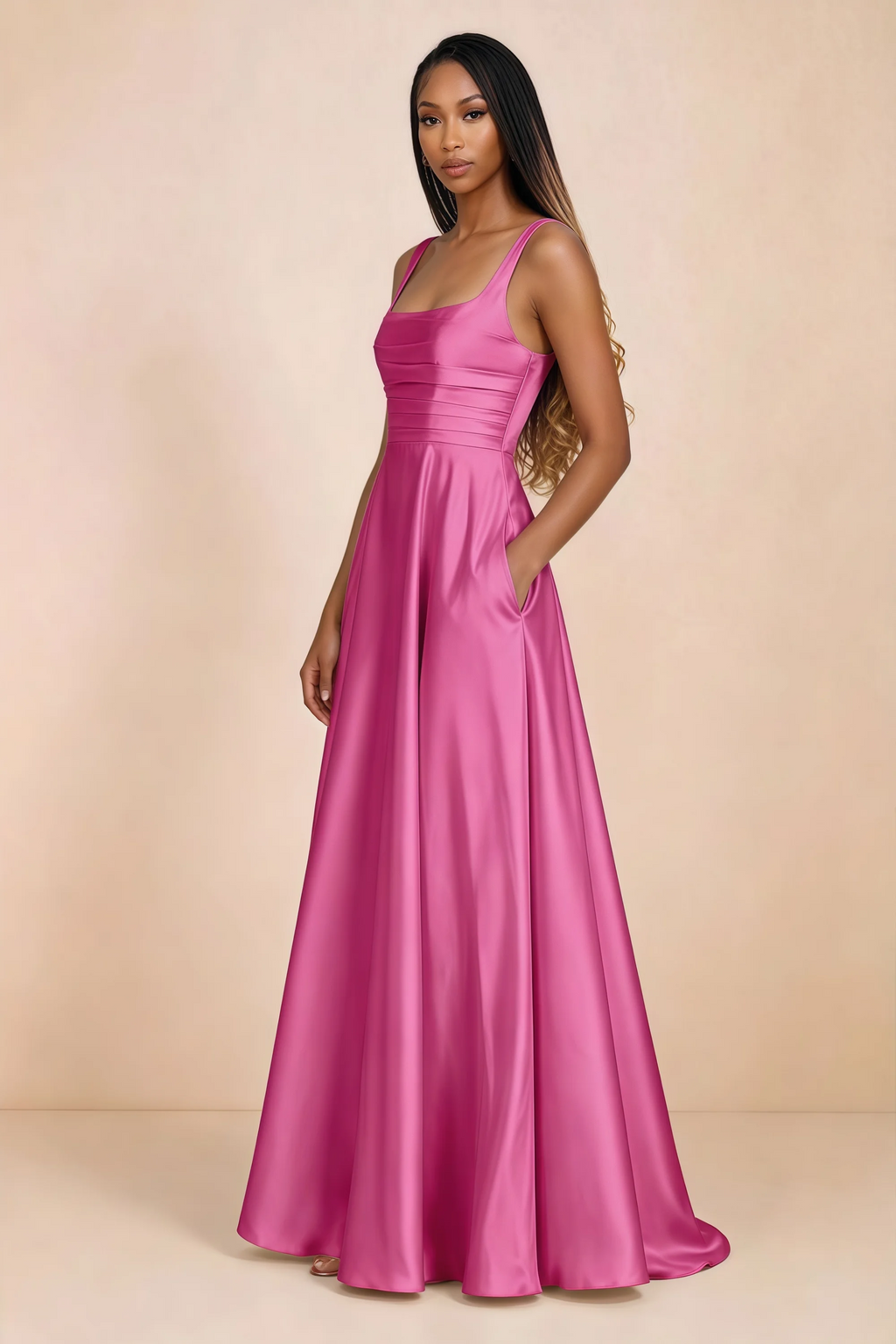 Three-quarter studio view of Becky fuchsia satin maxi dress with a hand resting in the side pocket
