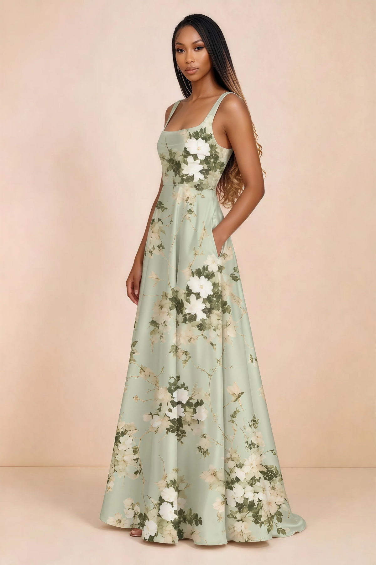 Three-quarter studio view of Becky green floral satin maxi dress with a hand resting in the side pocket