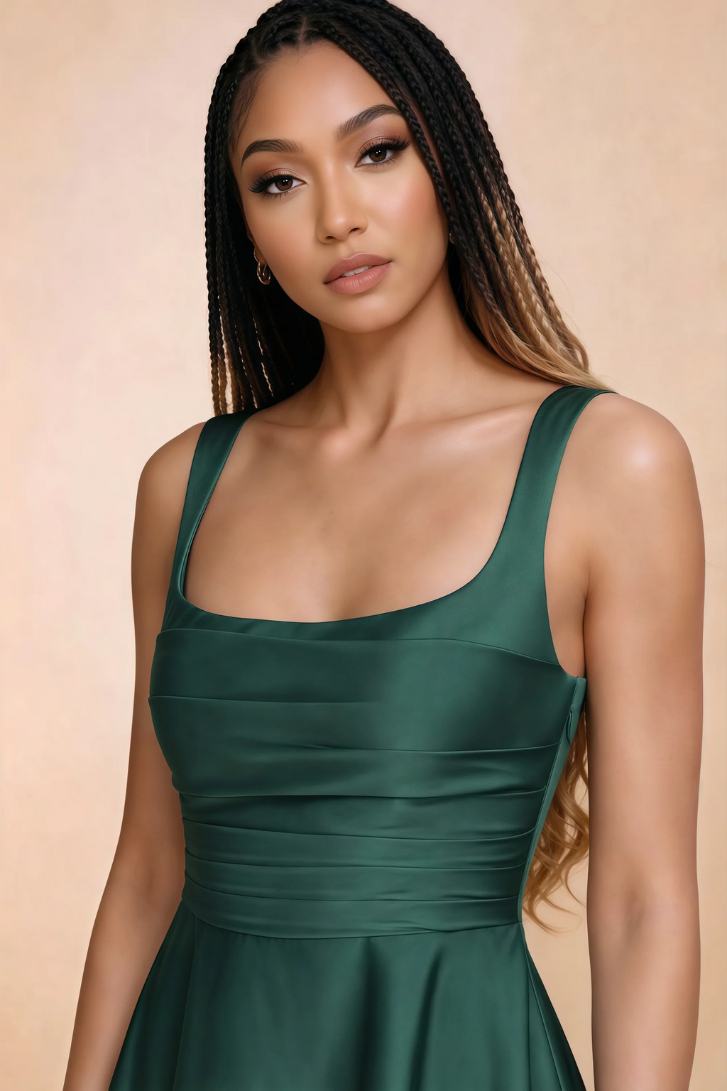 Close-up of Becky hunter green square neckline, shoulder straps and horizontal bodice pleats