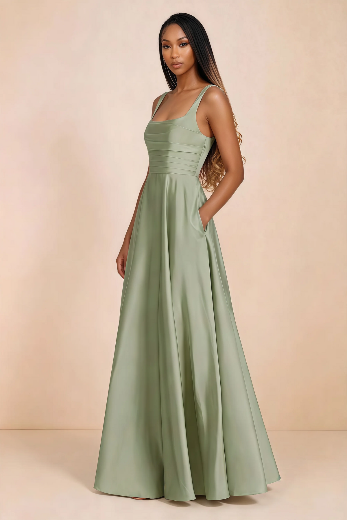Three-quarter studio view of Becky light green satin maxi dress with a hand resting in the side pocket