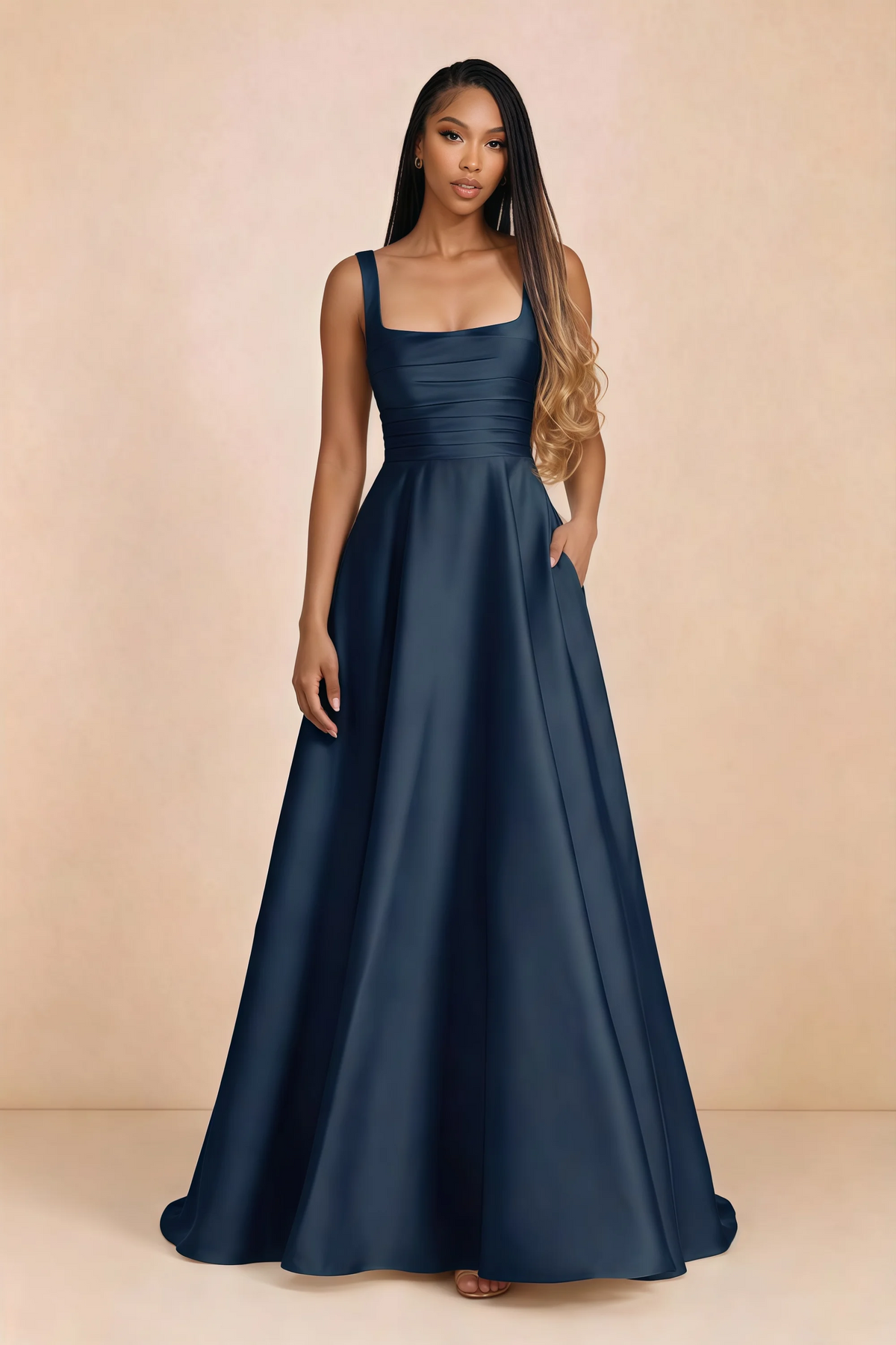 Front studio view of Becky navy satin maxi dress showing the square neckline, pleated bodice and full A-line skirt
