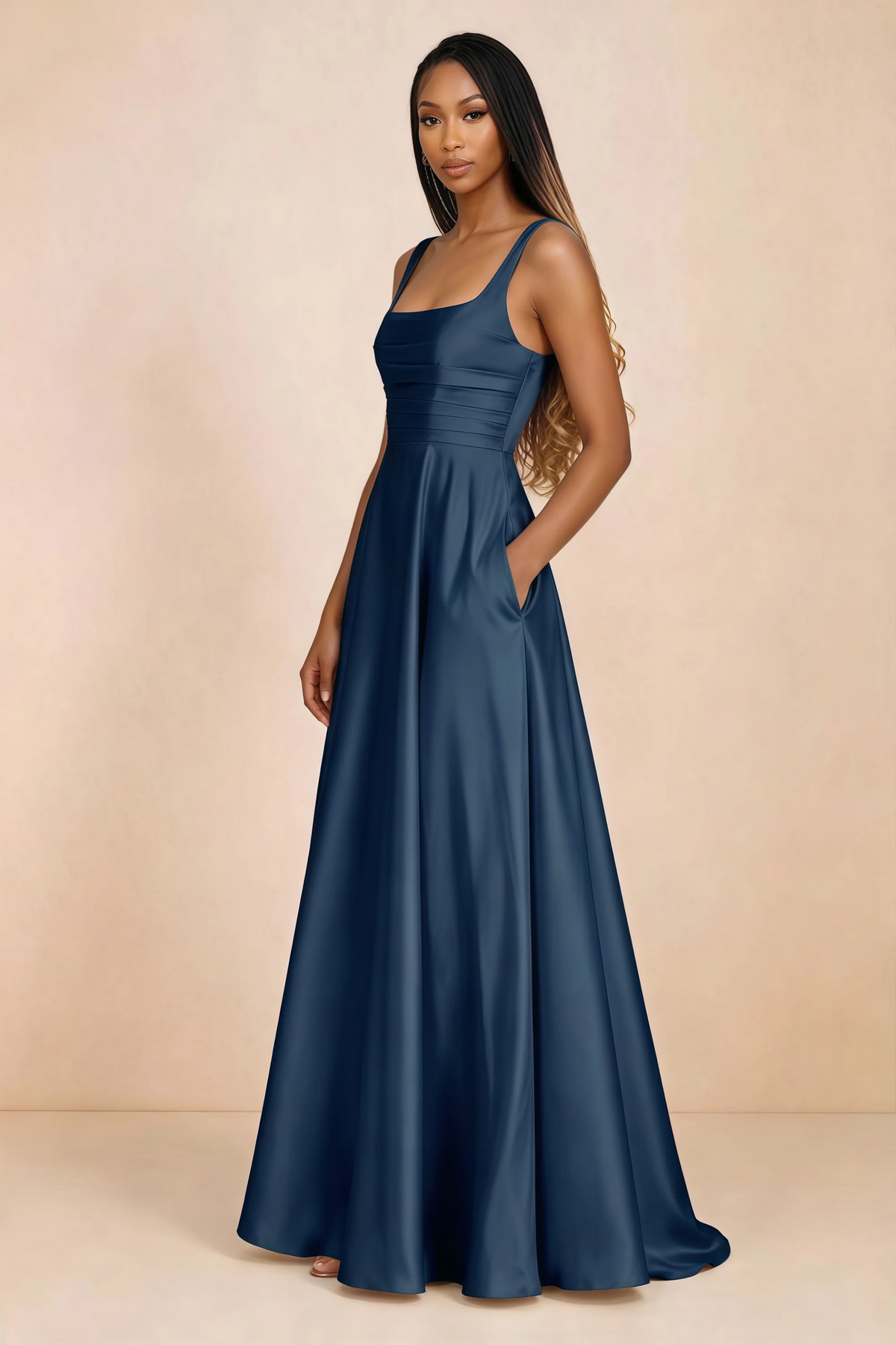 Three-quarter studio view of Becky navy satin maxi dress with a hand resting in the side pocket